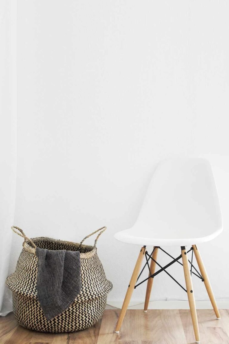 image of basket and small white chair by Sarah Dorweiler